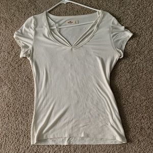 white tee shirt with cross string in front